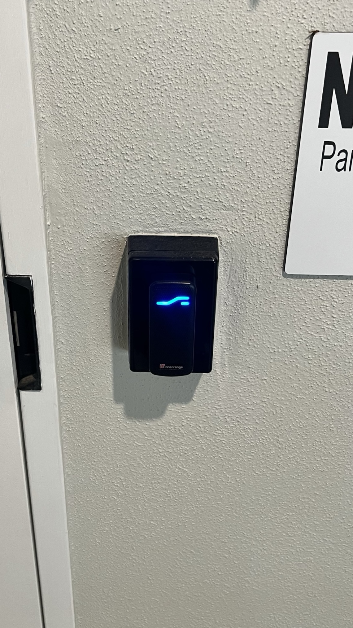 Card reader and fob access system mounted on a wall
