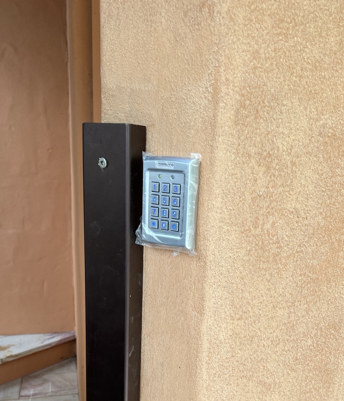 Keypad entry system for secure door access